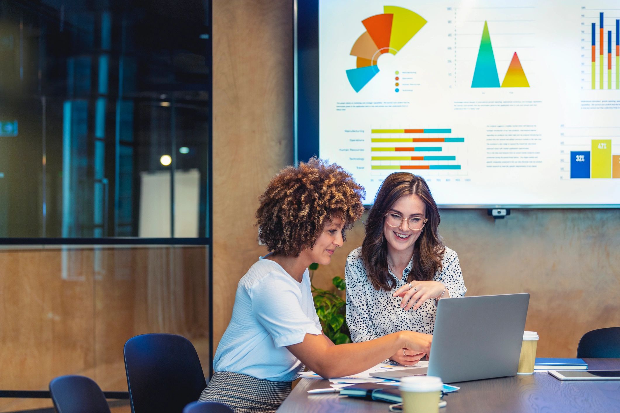 Professionals reviewing bookkeeping work together